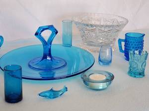 lot 110 image: (11) pc Blue and Clear Glassware Home Decor Lot