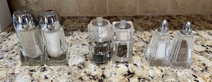 lot 245 image: 16 Sets of Salt and Pepper Shakers & Napkin Rings