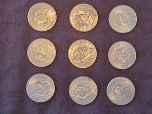 lot 156 image: (9) Ike One Dollar Coins