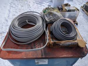 lot 100 image: Spools of Romex Wire 102 & 142  Appliance Cords