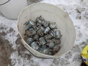 lot 186 image: Large Bucket of 12V Solenoids