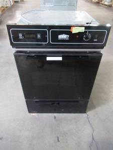 lot 323 image: Summit Appliance 24 in. Single Gas Wall Oven in Black TTM7212DK