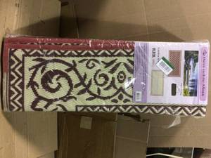 lot 55 image: 9 ft. x 18 ft. Reversible Mat - Classic BurgundyBeige by Reversible Mats Open Box Customer Returns See pictures.