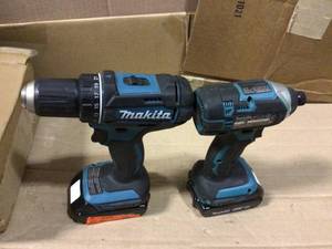 lot 61 image: 18-Volt LXT Lithium-Ion Brushless Cordless 12 in. Driver-Drill Kit, 3.0Ah by Makita Open Box Customer Returns See pictures.