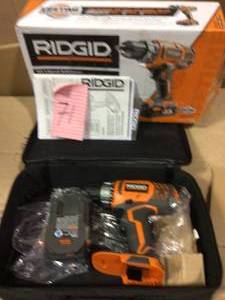 lot 71 image: 18-Volt Lithium-Ion Cordless 2-Speed 12 in. Compact DrillDriver Kit with 2 Ah Battery, Charger, and Tool Bag by RIDGID Open Box Customer Returns See pictures.