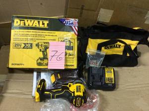 lot 76 image: 20-Volt MAX XR Cordless Brushless 3-Speed 14 in. Impact Driver with (1) 20-Volt 5.0Ah Battery & Charger by DEWALT Open Box Customer Returns See pictures.