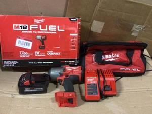 lot 79 image: M18 FUEL 18-Volt Lithium-Ion Brushless Cordless 12 in. Impact Wrench wFriction Ring Kit wOne 5.0 Ah Battery and Bag by Milwaukee Open Box Customer Returns See pictures.