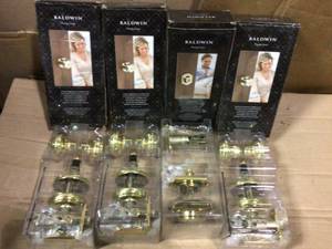 lot 100 image: Lot of Prestige Alcott Polished Brass BedBath Door Knob by Baldwin Open Box Customer Returns See pictures.