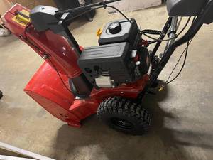 lot 118 image: Power Max 824 OE 24 in. 252cc Two-Stage Electric Start Gas Snow Blower by Toro in working conditions
