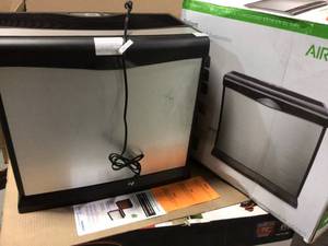 lot 22 image: 5 Gal. Evaporative Humidifier for 4,000 sq. ft. by AIRCARE Customer returns see pictures