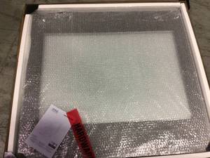 lot 23 image: 33 in. W x 36 in. H Framed Rectangular Bathroom Vanity Mirror in Black in good condition