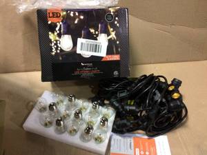 lot 28 image: 48 ft. 2-Watt Outdoor Weatherproof LED String Light with S14 LED Filament Light Bulbs Included in good condition 