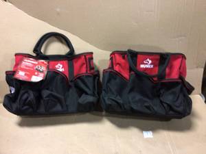 lot 29 image: 14 in. Wide Mouth Water Resistant Supply Bag with padded handle comfort grips tape strap and 15 total pockets in Red by Husky in good conditon 
