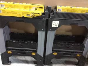 lot 31 image: 33 in. Folding Sawhorse with Adjustable Metal Legs by DEWALT in good condition 