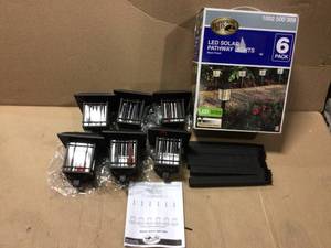 lot 62 image: Solar Black Outdoor Integrated LED 3000K 6-Lumens Landscape Pathway Light (6-Pack) Customer returns see pictures