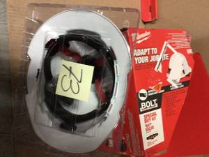 lot 73 image: 450 Lumens LED SpotFlood Headlamp with Hardhat by Milwaukee in good condition 