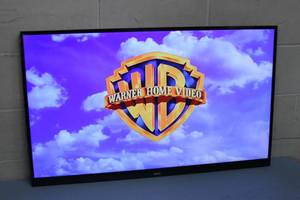 lot 100 image: 42 LED Edge-Lit Commercial Grade NEC Display  Monitor  Television  TV with Integrated Tuner - Model E424