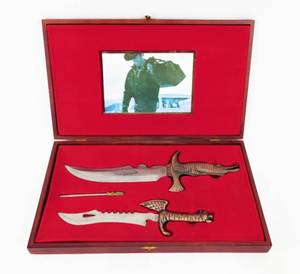 lot 17 image: Vintage Crocodile and Tiger Knife Set