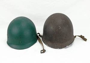 lot 15 image: Vintage WWII Korean War Era U.S. M1 Military Helmet With Liner