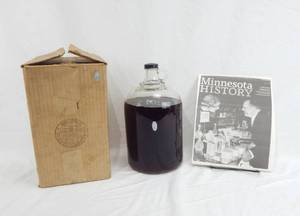 lot 5 image: Vintage 1920s Prohibition Era Nipola Company Pagan Princess Perfume Gallon Jug With Historical Documentation