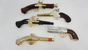 lot 36 image: Vintage AVON GunPistol Decanters