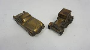 lot 73 image: Vintage 1915 Chevrolet Metal Bank  1953 Chevy Corvette Metal Bank