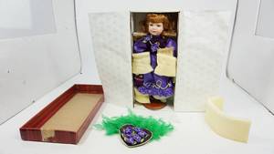 lot 107 image: Dynasty Doll Collection - Miss February