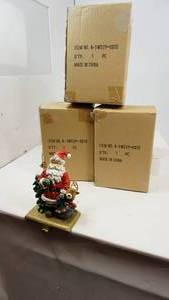 lot 144 image: 3 Brass Christmas Stocking Holders for Mantel