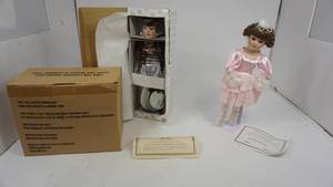 lot 169 image: New Collectible Heritage Signature Collection Doll  The Carlisle Collection Doll  AVON Tina the Lighted Snow Lady
