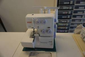 lot 4 image: Janome New Home Model 3434D Differential Feed Commercial Serger
