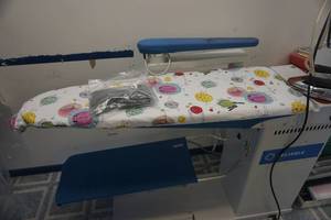 lot 8 image: Reliable Model 624HA Commercial Vacuum Steam Pressing Table