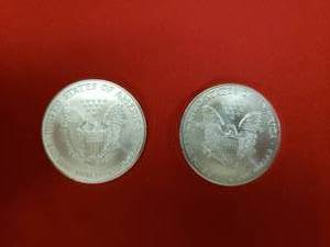 lot 9 image: 2- 1998 American Silver Eagles