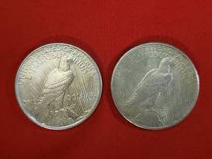 lot 29 image: 2- 1925 Silver Peace Dollars