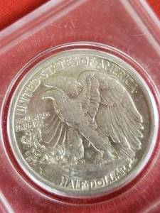 lot 68 image: 1949 Walking Liberty Silver half dollar