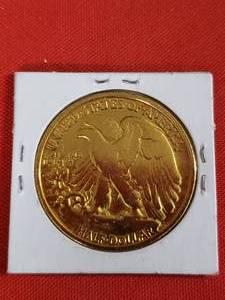 lot 70 image: 1941 Walking Liberty Silver half dollar