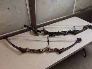 lot 21 image: 2-Vintage Compound Bows