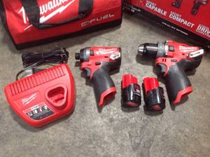 Milwaukee M12 FUEL 12-Volt Lithium-Ion Brushless Cordless Hammer Drill and Impact Driver Combo Kit w 2 Batteries and Bag (2-Tool) see pictures