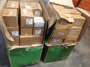Pallet of Zoom hand free hand sets see pictures