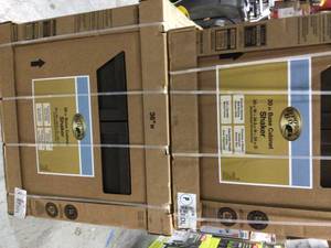Pallet with assorted Hampton Bay Cabinets see pictures