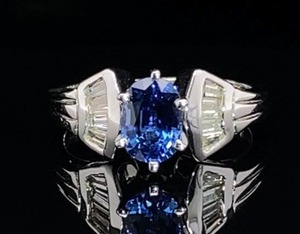 lot 4 image: High End Royal Blue Oval Sapphire with Tapered Diamond Baguettes in 14k White Gold $8,800 Retail