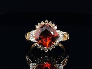 lot 45 image: Spectacular Sunset Orange Cushion Cut Garnet Ring with Diamond Accents in 14k Yellow Gold