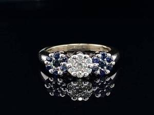 lot 87 image: Diamond and Blue Sapphire Fleurette Styled Estate Ring in 14k White Gold $1,550 Retail