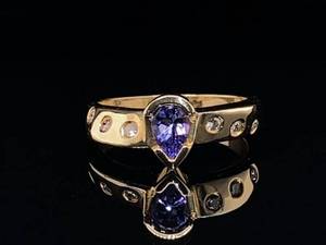 lot 68 image: Fine  12 Carat Tanzanite and Bezel Set Diamond Estate Ring in 14k Yellow Gold $1,999 Retail