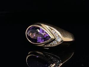 lot 33 image: Exquisite 5 Carat Weight Pear Shaped Amethyst Ring with Diamonds in 14k Yellow Gold $2,215 Retail
