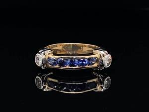 lot 34 image: Brilliant Blue Sapphire and Diamond Ring in 14k White and Yellow Gold $3,200 Retail