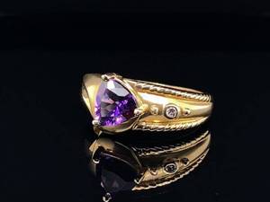 lot 75 image: Custom Made Trillion Cut Amethyst and Diamond Estate Ring in 14k Yellow Gold $2,750 Retail