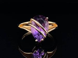 lot 62 image: Purple Amethyst Estate Ring With 14k Yellow Gold Wrap $1,150