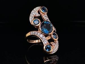 lot 97 image: Luscious London Blue Topaz and White Gem Stone Swirl Estate Ring