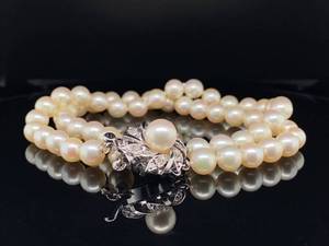 lot 64 image: Elegant Double Strand Pearl Bracelet With Stunning Clasp