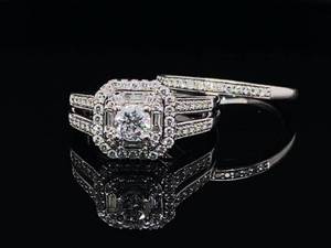 lot 5 image: Magnificent 1.25 Carat Diamond Halo Wedding Ring Set in 14k White Gold $7,150 Retail
